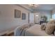 Cozy bedroom showcases modern lighting, a comfortable bed, and minimalist wall art at 315 40Th S St, St Petersburg, FL 33711