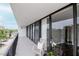 Spacious balcony featuring seating and large sliding doors providing panoramic views at 3211 W Swann Ave # 502, Tampa, FL 33609