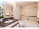 Bathroom featuring granite countertops and a shower/tub combo at 3211 W Swann Ave # 502, Tampa, FL 33609