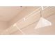 Close-up of closet rod for hanging clothes at 3211 W Swann Ave # 502, Tampa, FL 33609