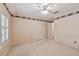 Spacious carpeted bedroom with natural light streaming through the window at 4044 Priory Cir, Tampa, FL 33618