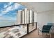 Enjoy ocean views from the condo balcony with seating and overlooks the pool deck and beach at 450 S Gulfview Blvd # 605, Clearwater Beach, FL 33767