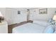 Bedroom with two beds, wood-look flooring, and closet storage at 450 S Gulfview Blvd # 605, Clearwater Beach, FL 33767