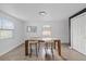 Bright dining room with large windows and modern furnishings at 5220 Pine St, Seffner, FL 33584