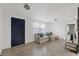 Cozy living room with large front door and lots of natural light at 5220 Pine St, Seffner, FL 33584