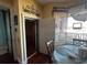 Interior shot of private residential elevator adjacent to dining area at 541 Treviso Dr, Apollo Beach, FL 33572