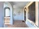 Covered entryway featuring tiled flooring, and decorative ironwork at 541 Treviso Dr, Apollo Beach, FL 33572