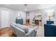Cozy living room showcasing hardwood floors, neutral paint, and stylish furnishings, creating a warm space at 6041 16Th Ne Ln, St Petersburg, FL 33703