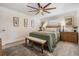 Serene main bedroom featuring neutral colors, fan, and wooden furniture at 6041 16Th Ne Ln, St Petersburg, FL 33703