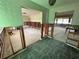 Spacious living room featuring an open floor plan and partially removed drywall at 701 64Th Ave, St Pete Beach, FL 33706