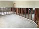 Spacious living room with exposed walls and concrete flooring, needing renovations and improvements at 701 64Th Ave, St Pete Beach, FL 33706