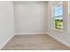 Bright bedroom with a large window providing ample natural light at 7258 Kodiak Ln, Sarasota, FL 34240