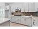 Close-up of the kitchen featuring granite counters and a gas cooktop at 7258 Kodiak Ln, Sarasota, FL 34240