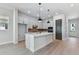 Bright kitchen featuring a center island, modern appliances and an exterior exit at 7258 Kodiak Ln, Sarasota, FL 34240