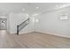 Bright room with stairs, recessed lights and modern flooring at 7258 Kodiak Ln, Sarasota, FL 34240