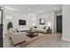 Inviting living room showcases stylish furniture, a cozy rug, and bright, neutral decor for comfortable living space at 7258 Kodiak Ln, Sarasota, FL 34240