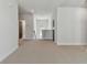 Upstairs loft area with dark doors, recessed lighting and carpeted floors at 7258 Kodiak Ln, Sarasota, FL 34240