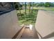 Stairwell leading into backyard at 8003 Bardmoor Pl # 204, Seminole, FL 33777