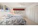 Bright, airy bedroom with four large windows and multiple closets at 8003 Bardmoor Pl # 204, Seminole, FL 33777