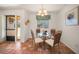 Cozy dining area with natural light and seating for four at 8003 Bardmoor Pl # 204, Seminole, FL 33777