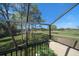 View of the golf course from the screened patio at 8003 Bardmoor Pl # 204, Seminole, FL 33777