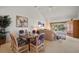 Living room with vaulted ceilings, view to the outside, and comfortable furniture at 8003 Bardmoor Pl # 204, Seminole, FL 33777