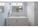 Light and airy bathroom with marble countertop and blue walls at 9618 N 55Th St, Temple Terrace, FL 33617