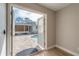 Inviting view from inside the home to a private pool and brick-paved patio area, perfect for outdoor entertaining at 9618 N 55Th St, Temple Terrace, FL 33617