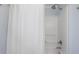 Clean white shower with brushed nickel shower head and hardware at 9618 N 55Th St, Temple Terrace, FL 33617