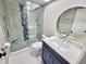Modern bathroom features a glass enclosed shower, vanity, and stylish fixtures at 9914 Indian Key Trl # 32, Seminole, FL 33776