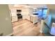 Spacious kitchen with stainless steel appliances, updated cabinets, and a large island at 9914 Indian Key Trl # 32, Seminole, FL 33776
