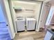 Convenient laundry room with a modern washer and dryer for easy laundry at 9914 Indian Key Trl # 32, Seminole, FL 33776
