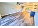 Bright and airy living room featuring modern flooring and an open floor plan at 9914 Indian Key Trl # 32, Seminole, FL 33776