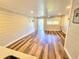 Open-concept living room with bright floors and an open layout to outdoor area at 9914 Indian Key Trl # 32, Seminole, FL 33776