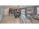 Open concept living space featuring kitchen, dining and living room areas at 10112 Rose Petal Pl, Riverview, FL 33578