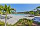 Beautiful community pool surrounded by lush landscaping and comfortable lounge chairs at 10112 Rose Petal Pl, Riverview, FL 33578