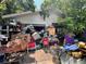 View of a garage filled with various items and debris, creating a cluttered and disorganized space at 12588 128Th Ave, Largo, FL 33774