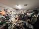 Interior view of a cluttered room, packed with numerous items and debris, showing disorganization at 12588 128Th Ave, Largo, FL 33774