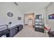 Flex room with furnishings and television at 1407 Tropical Oasis Ave, Plant City, FL 33565