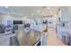 Expansive living space with ample seating, open layout, and view of the kitchen, great for entertaining at 1407 Tropical Oasis Ave, Plant City, FL 33565
