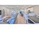 Spacious living area showcasing open floor plan and seamless transition to the adjacent kitchen and dining space at 1407 Tropical Oasis Ave, Plant City, FL 33565