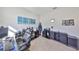 Office setup with modern desk, printer, and comfortable seating at 1407 Tropical Oasis Ave, Plant City, FL 33565