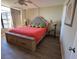 Inviting bedroom featuring a spacious bed and ample natural light at 17580 Gulf Blvd # 302, Redington Shores, FL 33708