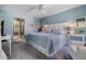 Light and airy bedroom featuring a comfortable bed and pleasant neutral tones at 1801 E Lake Rd # 5H, Palm Harbor, FL 34685