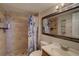 Bathroom featuring nautical themed shower curtain, tiled shower and floors, and a modern vanity sink at 1905 Oyster Catcher Ln # 911, Clearwater, FL 33762