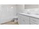 Well-lit bathroom with vanity, marble countertop, and modern fixtures at 2404 Florentine Way # 40, Clearwater, FL 33763