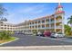 Beautiful condo with a light colored exterior, rows of balconies and ample parking at 2404 Florentine Way # 40, Clearwater, FL 33763
