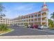 Charming condo building showcasing a classic design, ample parking, and well-kept landscaping at 2404 Florentine Way # 40, Clearwater, FL 33763