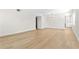 Large living room with hardwood floors, chandelier, and an open layout at 2404 Florentine Way # 40, Clearwater, FL 33763