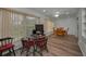 Dining area with wooden table, ample natural light, and connected to an office space at 2430 Florentine Way # 44, Clearwater, FL 33763